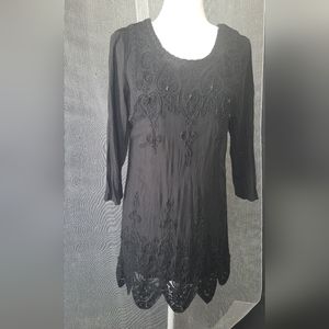 Lady's black mini dress